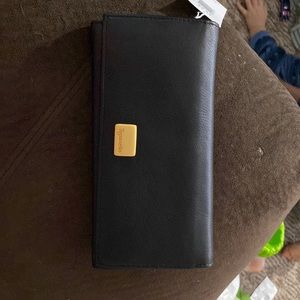 Brand new womens wallet with tag still on it
